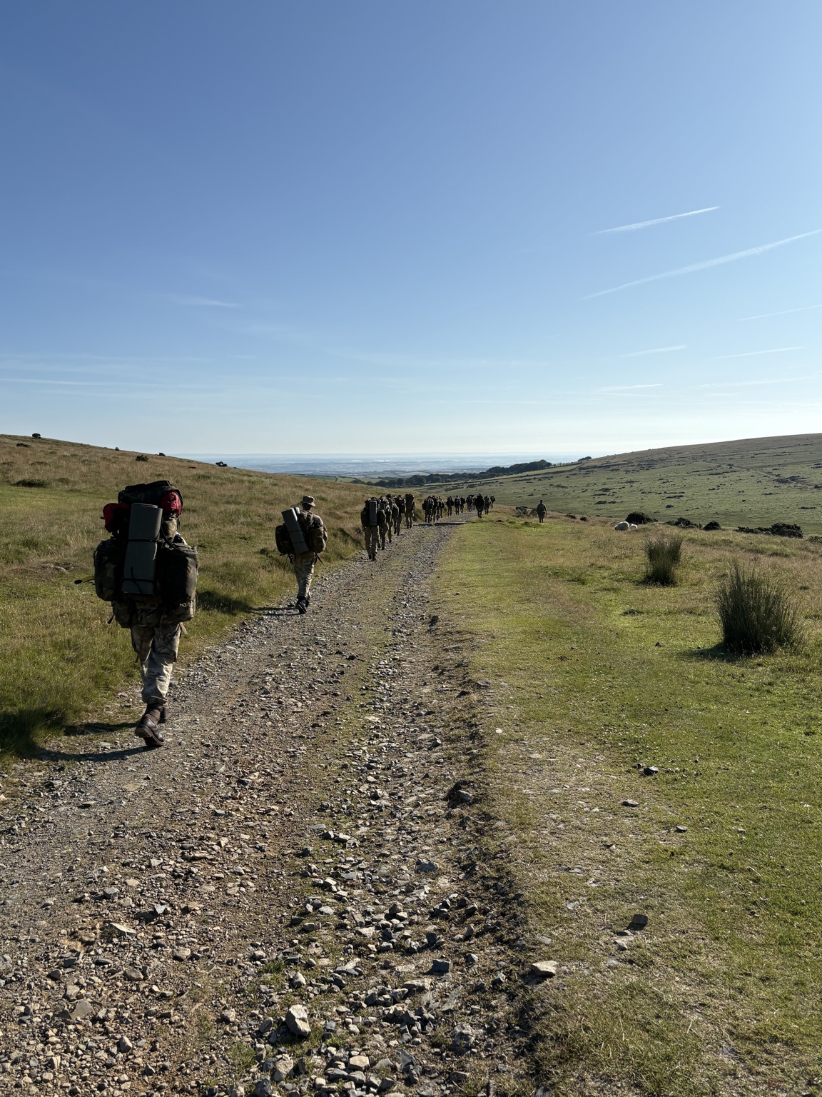Cadets walking with expedition packs