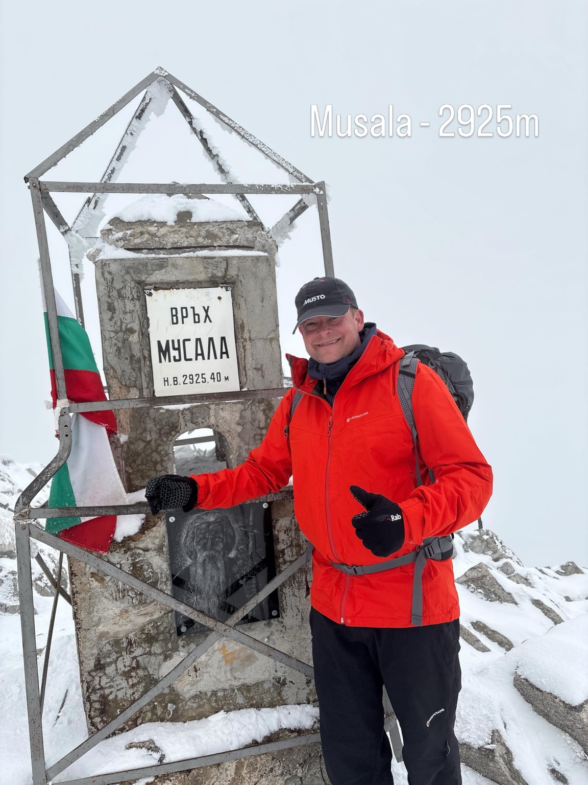 Jez Pitman beside the snow-covered Musala summit marker in Bulgaria